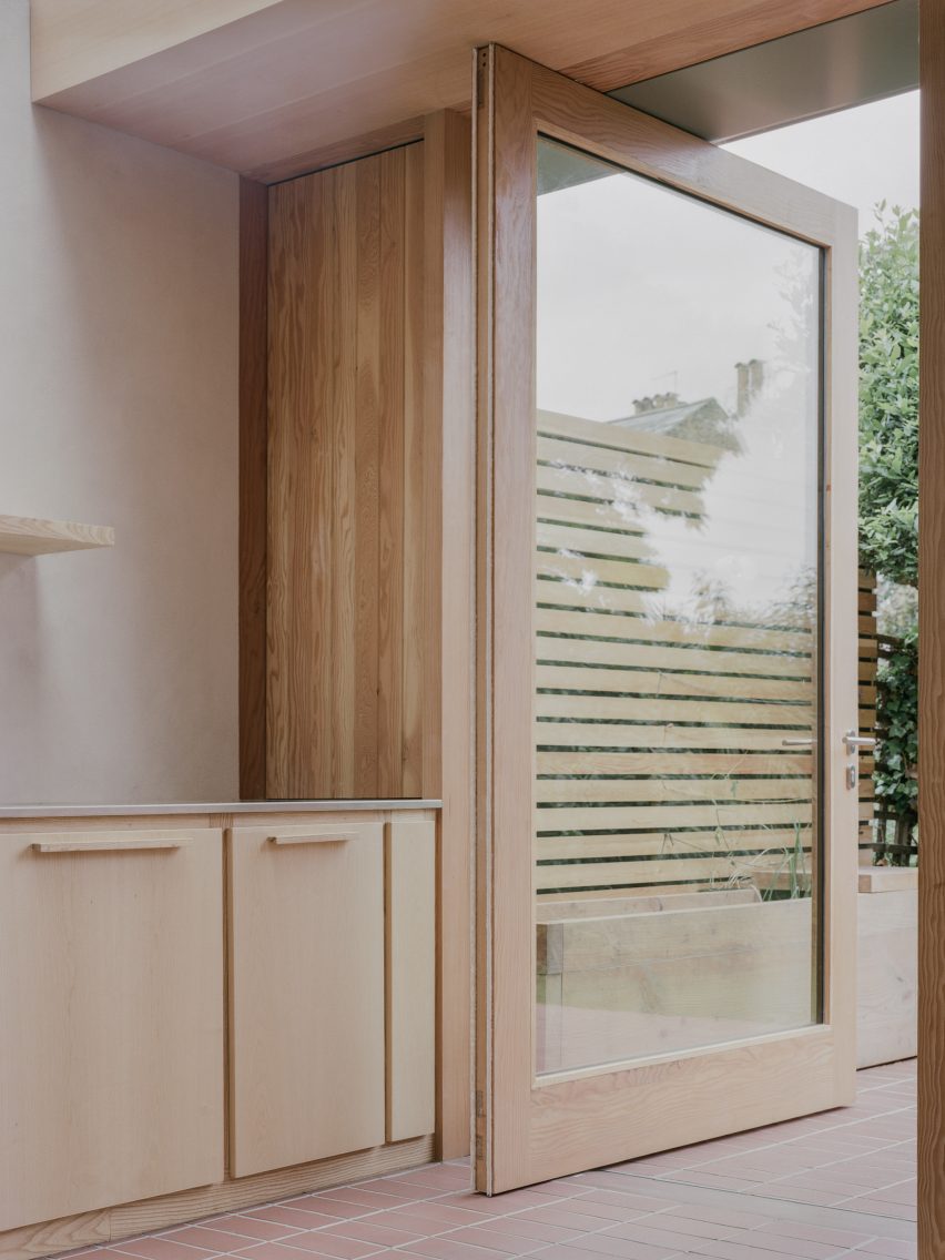Pivoting door in Herne Hill House extension by TYPE