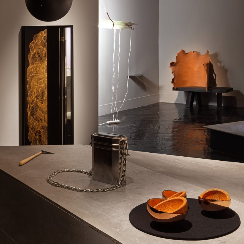 Objects have an orange finish at the exhibition