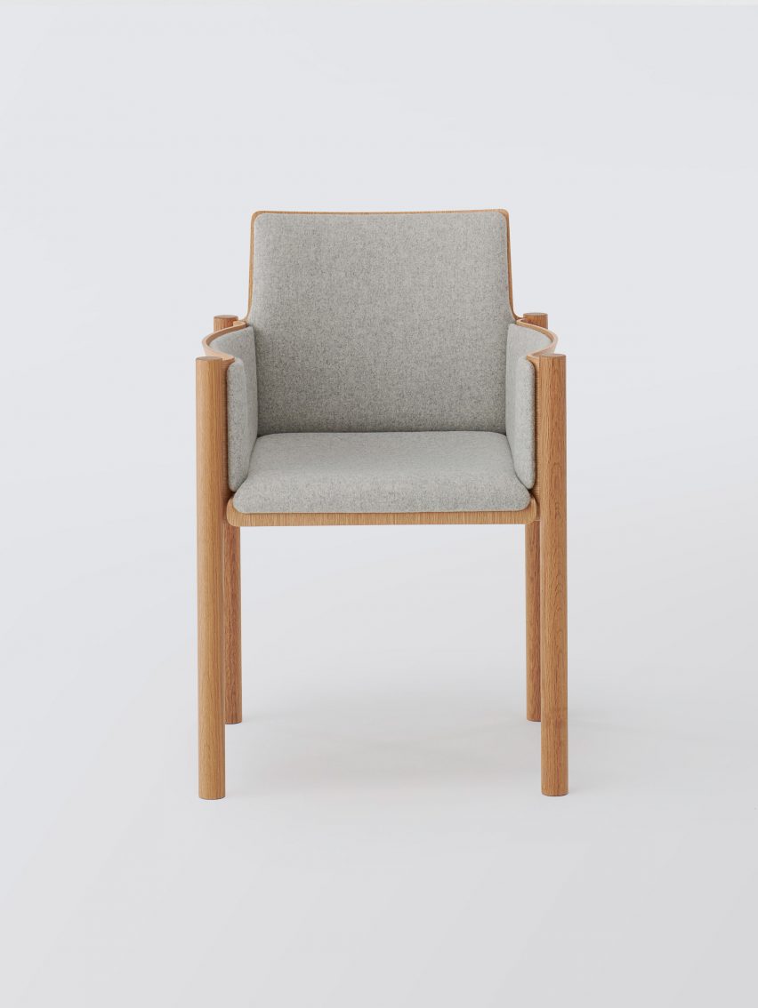 Image of the chair with a grey textile seat