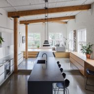 La Firme reorganises centuries-old Montreal loft with contemporary finishes