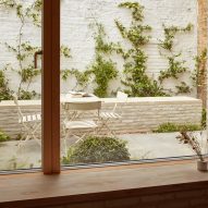 Window onto garden at Library House by Macdonald Wright Architects