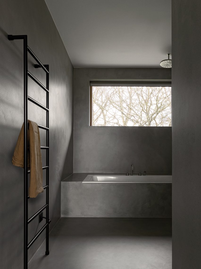 Bathroom with polished concrete surfaces