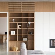 Living room with wooden shelving