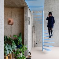 Studio Okami Architecten exposes brutalist skeleton of Antwerp apartment