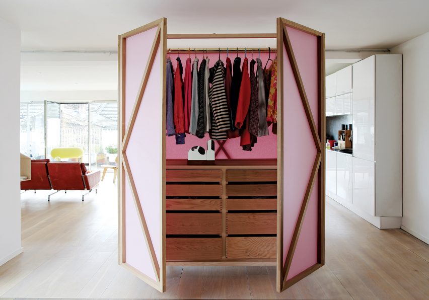 A pink wardrobe that doubles as a room divider