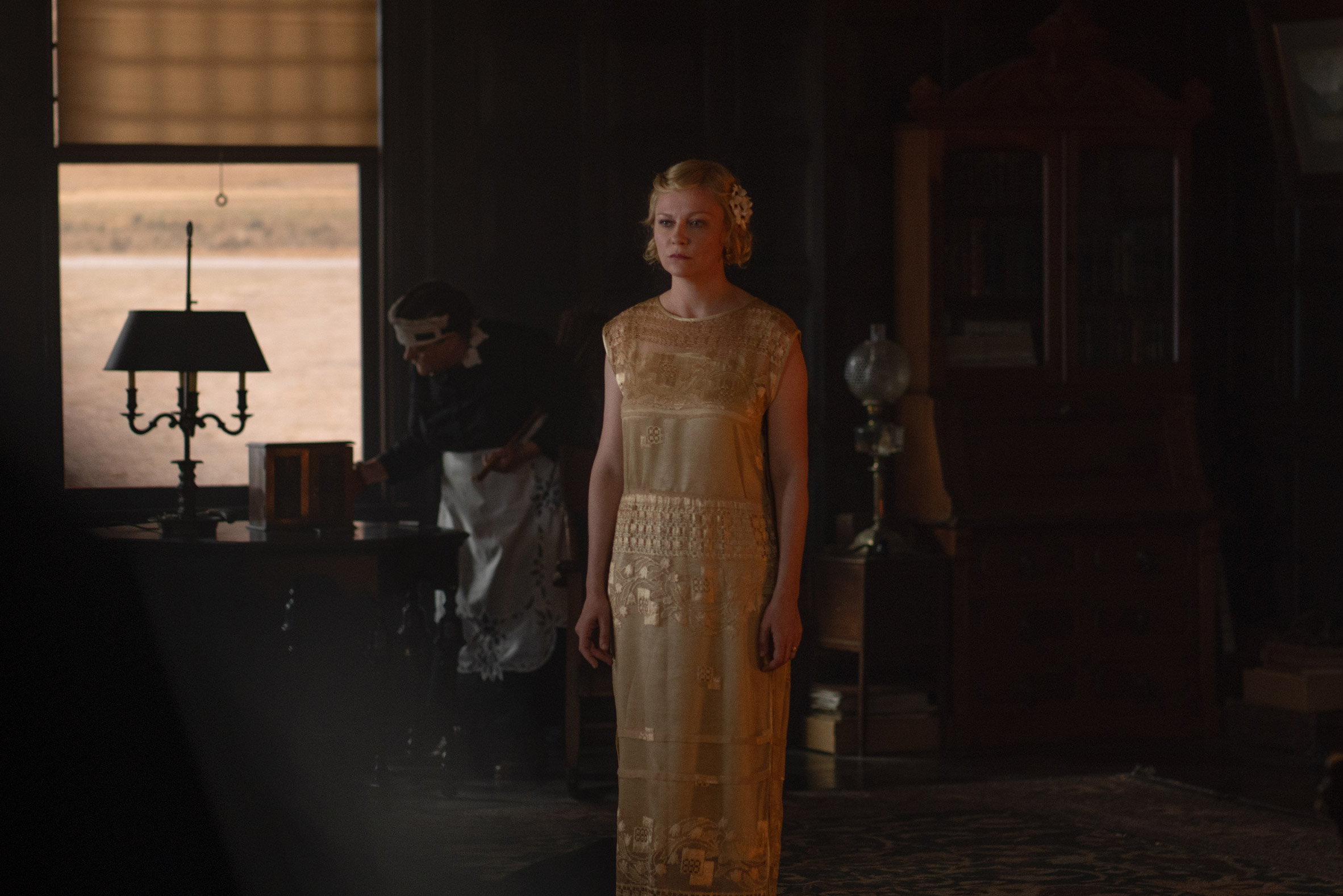 Dark interior of house in the Power of the Dog with Kirsten Dunst