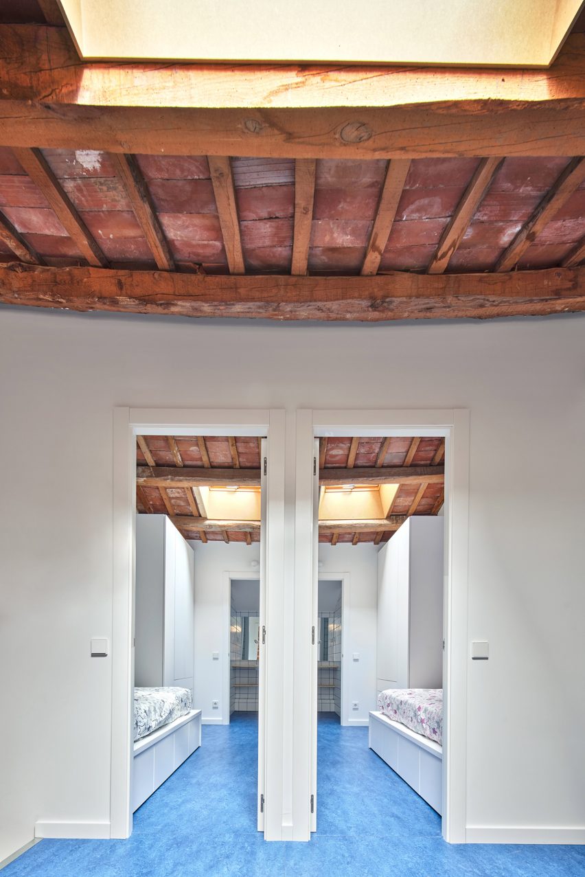 Bedrooms below original wooden ceilings of 105JON