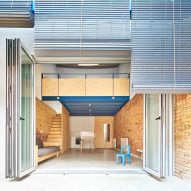 Vallribera Arquitectes adds bright-blue mezzanine to renovated Spanish house