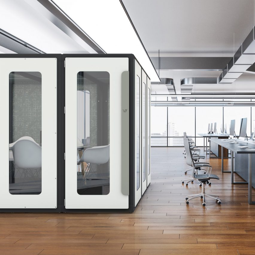 VicBooth Office booth with white walls and full length windows used in an open plan office with wooden floors