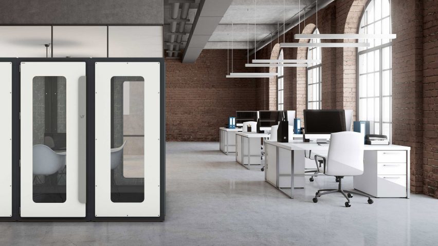 VicBooth Office booth with white walls and full length windows used in an open plan office with brick walls