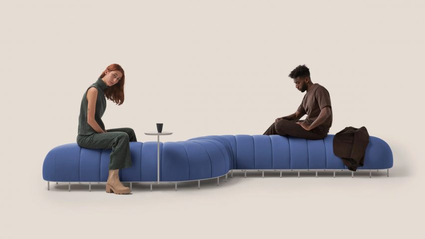 Worm sofa bench by Missana in royal blue with two people sitting on