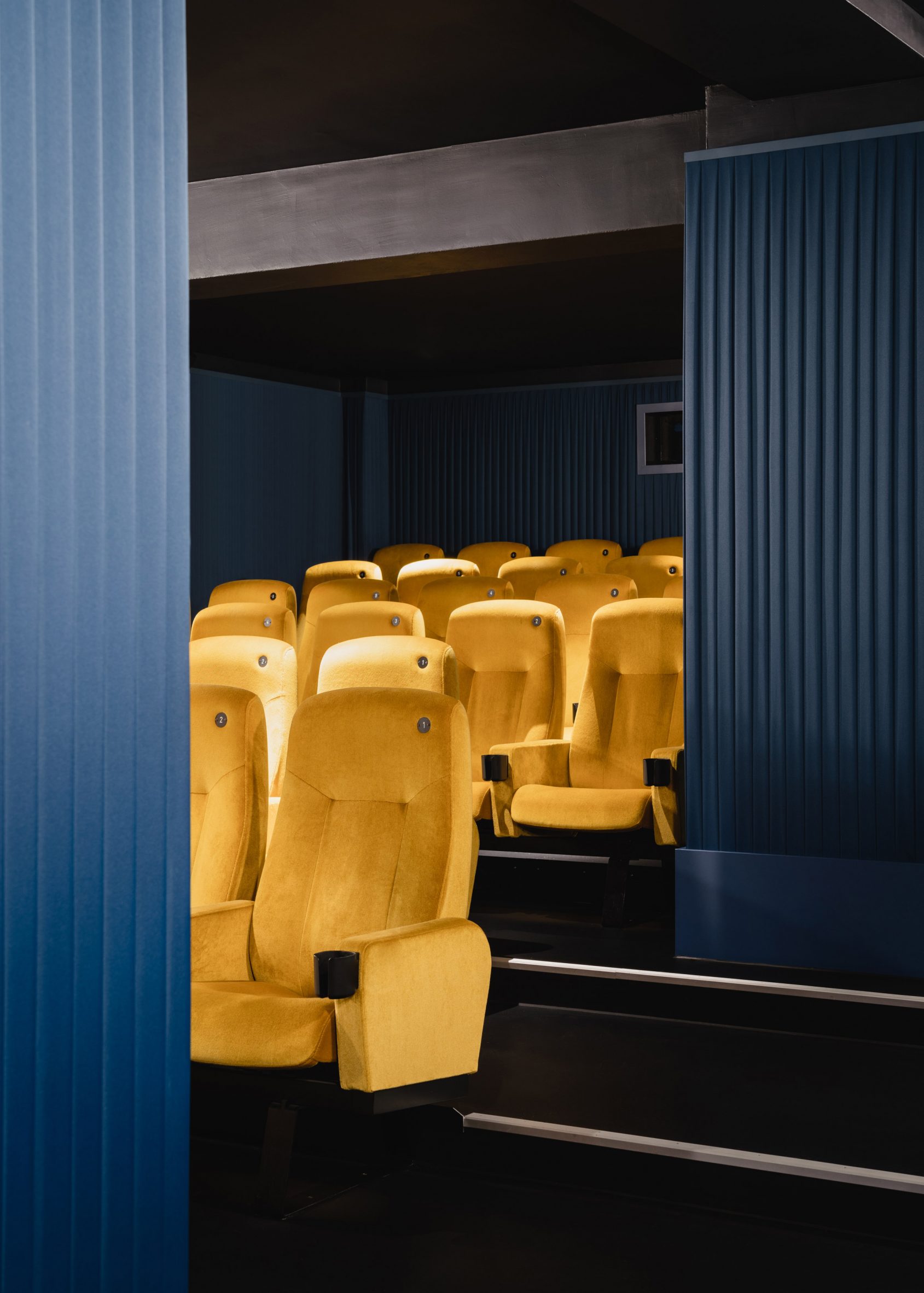 Blue and yellow cinema auditorium