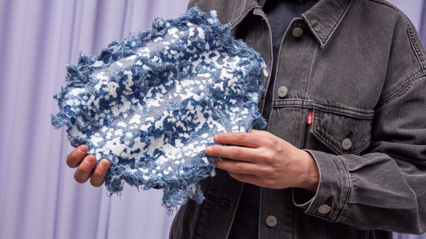 A photograph of a blue and white new material made from old Levi jeans