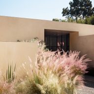 stucco and pink flowers