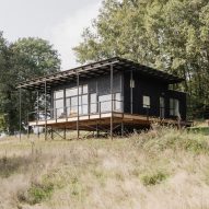 Ciguë uses steel foundations to elevate lightweight home in rural France