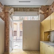 Brass kitchen features inside BSP20 House by Raúl Sánchez Architects