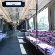 Wallace Sewell designs purple pinstripe fabric to create "a sense of speed" for the Elizabeth Line