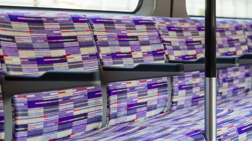 Purple patterned seats on a train