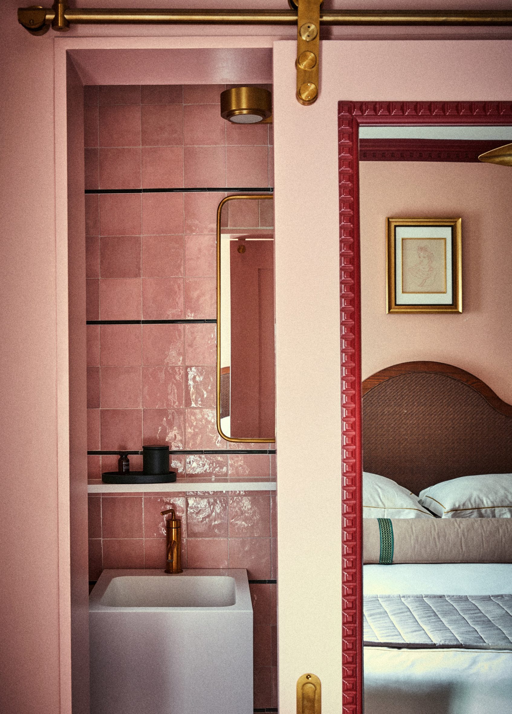 A pink bathroom inside Esme Hotel