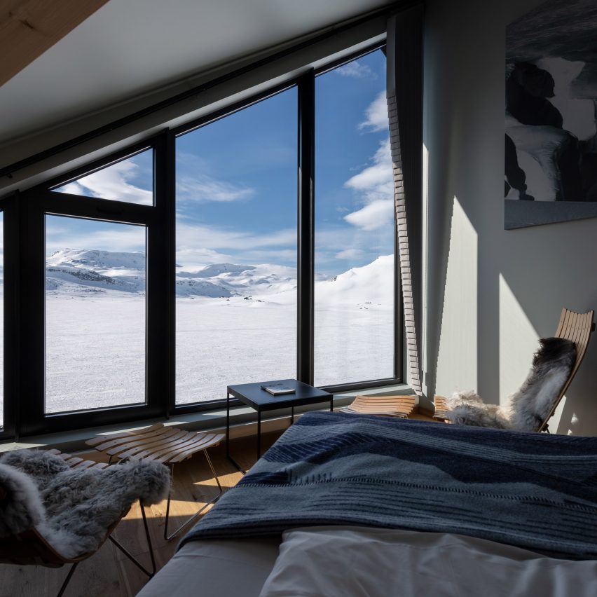 Interiors of bedroom set in gable of Norway's Hotel Finse 1222 designed by Snøhetta