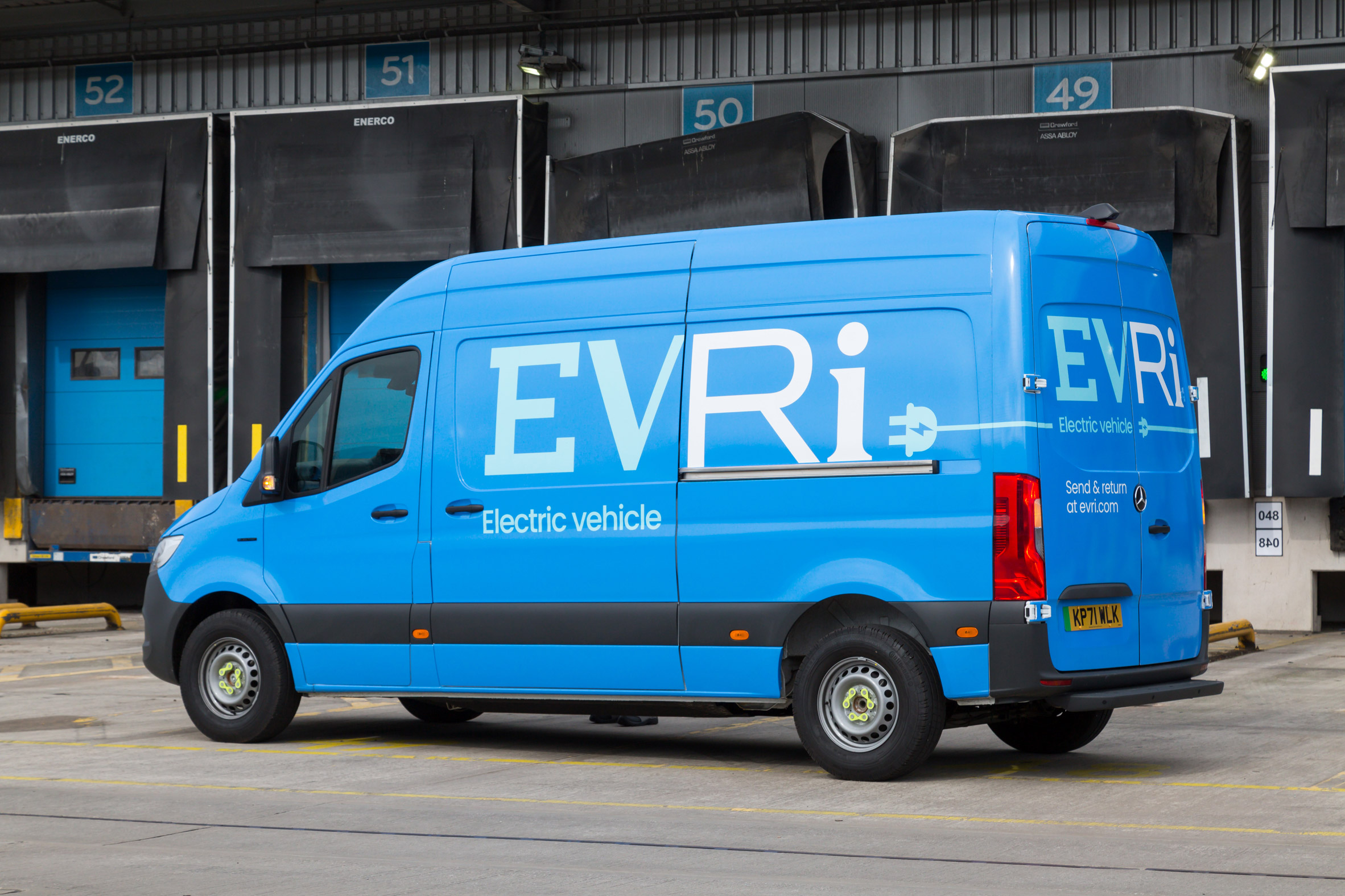 Blue Evri delivery truck parked on a street