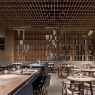 Hiba restaurant in Tel Aviv features oak and granite interior