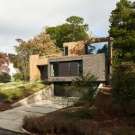 In Situ Studio creates HUUS house for sloped site in Raleigh