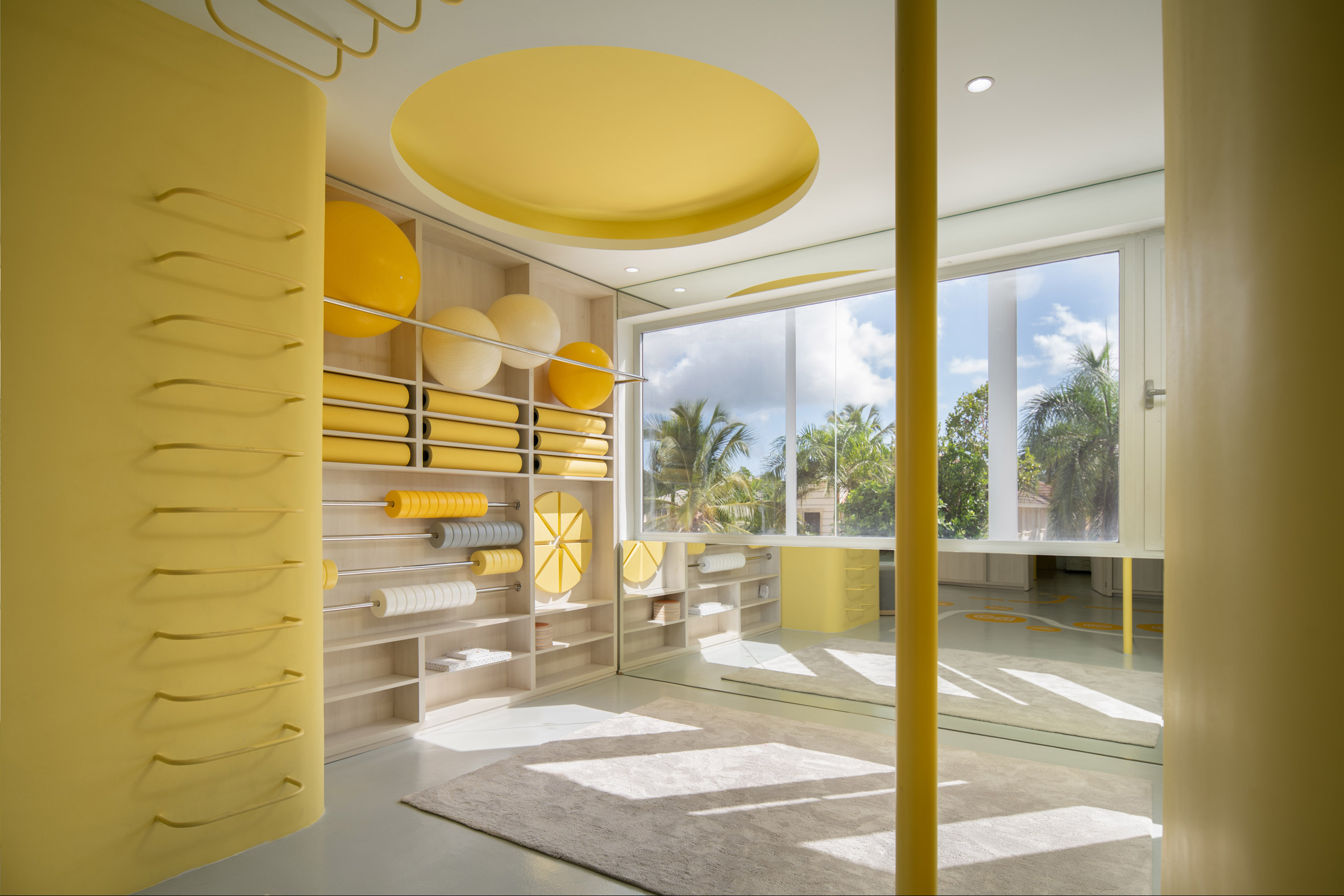 A school lobby with yellow walls