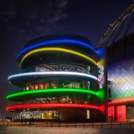 Joan Sibina creates cylindrical sports museum encircled by Olympic rings
