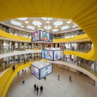 CF Møller Architects arranges Lego campus around circular yellow atrium
