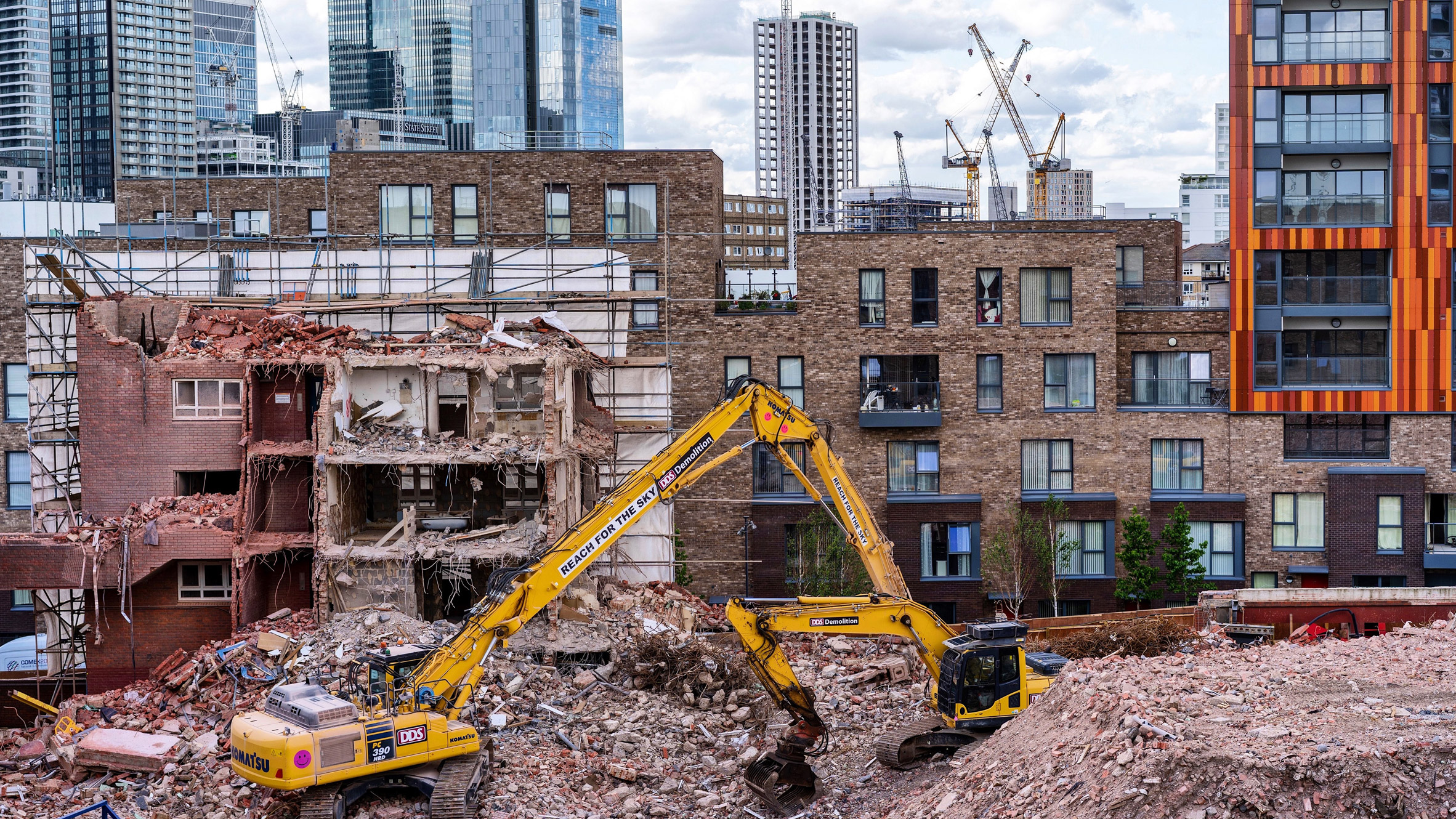 Crane in Canary Wharf demolition project used to illustrate story about London Plan Guidance about building retention