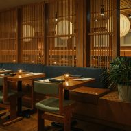 Wooden dowel screen divides Lonely Mouth restaurant