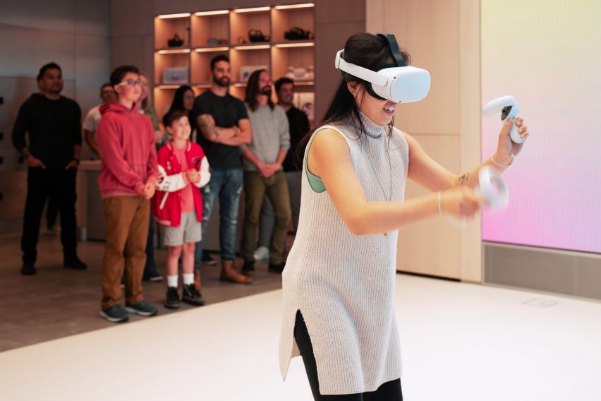 Woman playing a game with a virtual reality headset