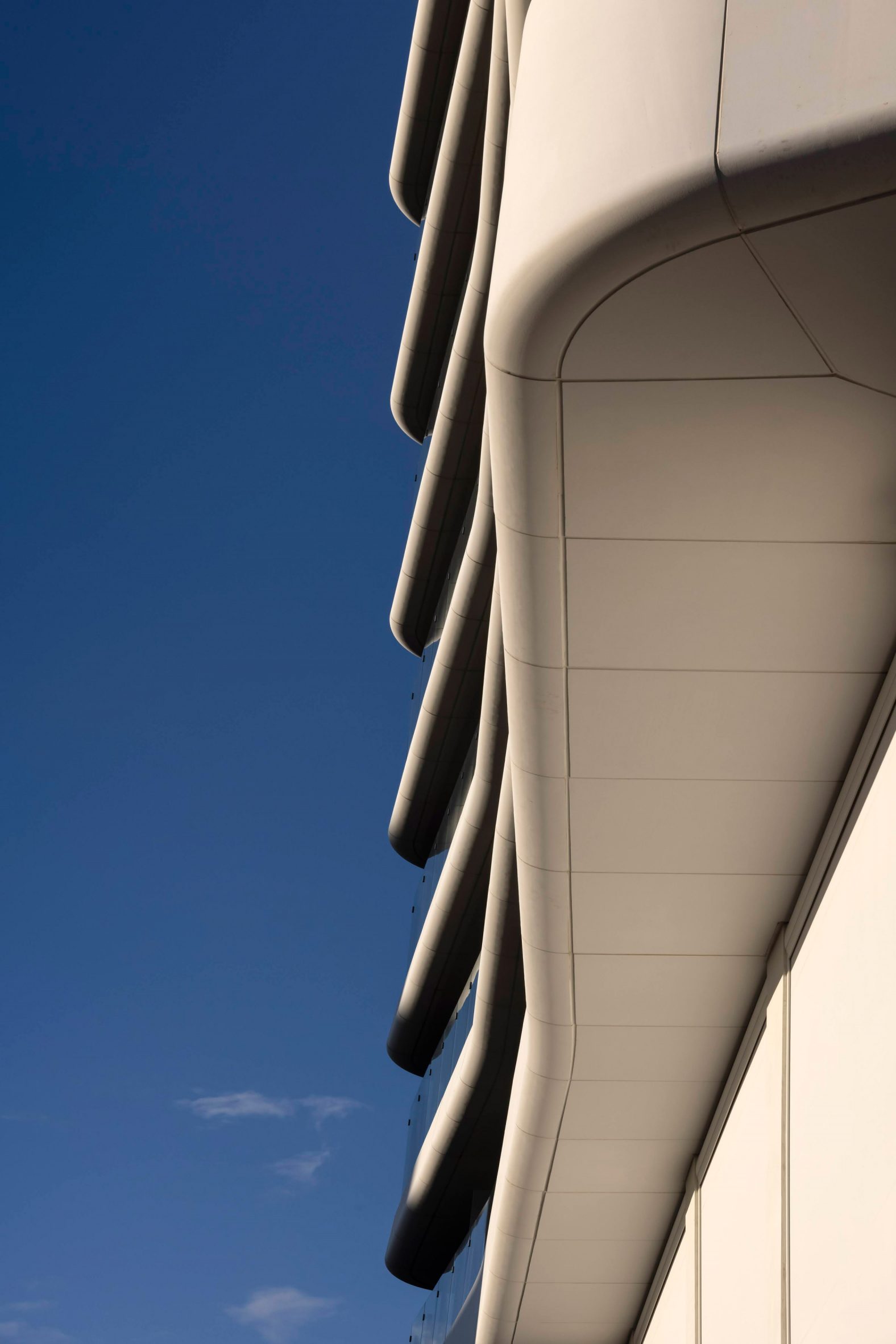 Image of the curving facade and balconies at the Antares Tower 
