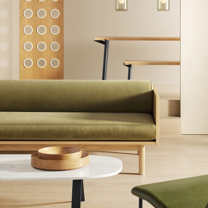 Souvenir Sofa by Blu Dot with green upholstery in a living room with wooden furnishings