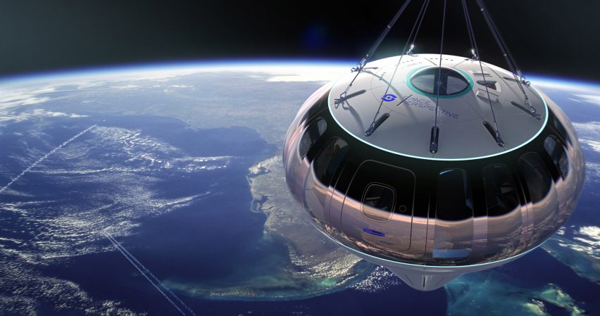 Exterior of round Spaceship Neptune capsule flying in space above the Earth