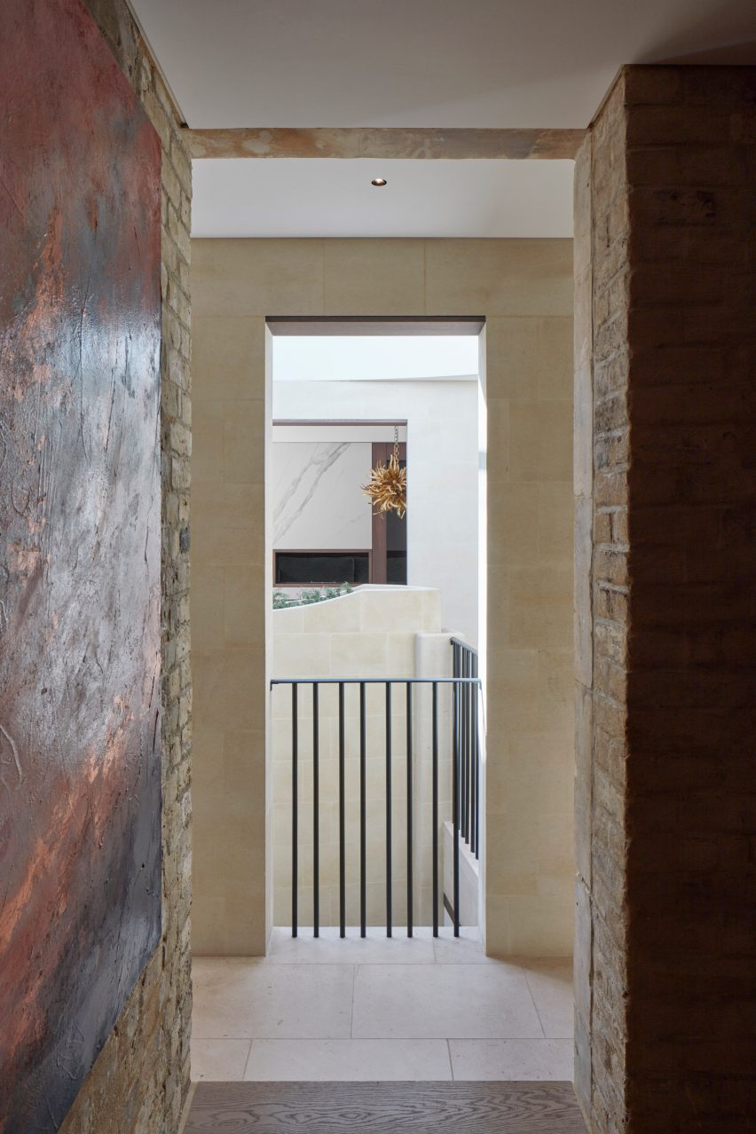 Hallway with exposed brick walls