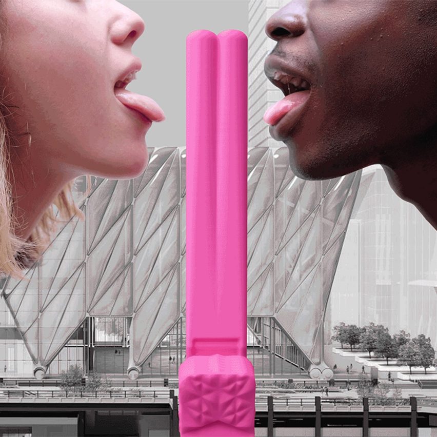 A pink sex toys between two faces
