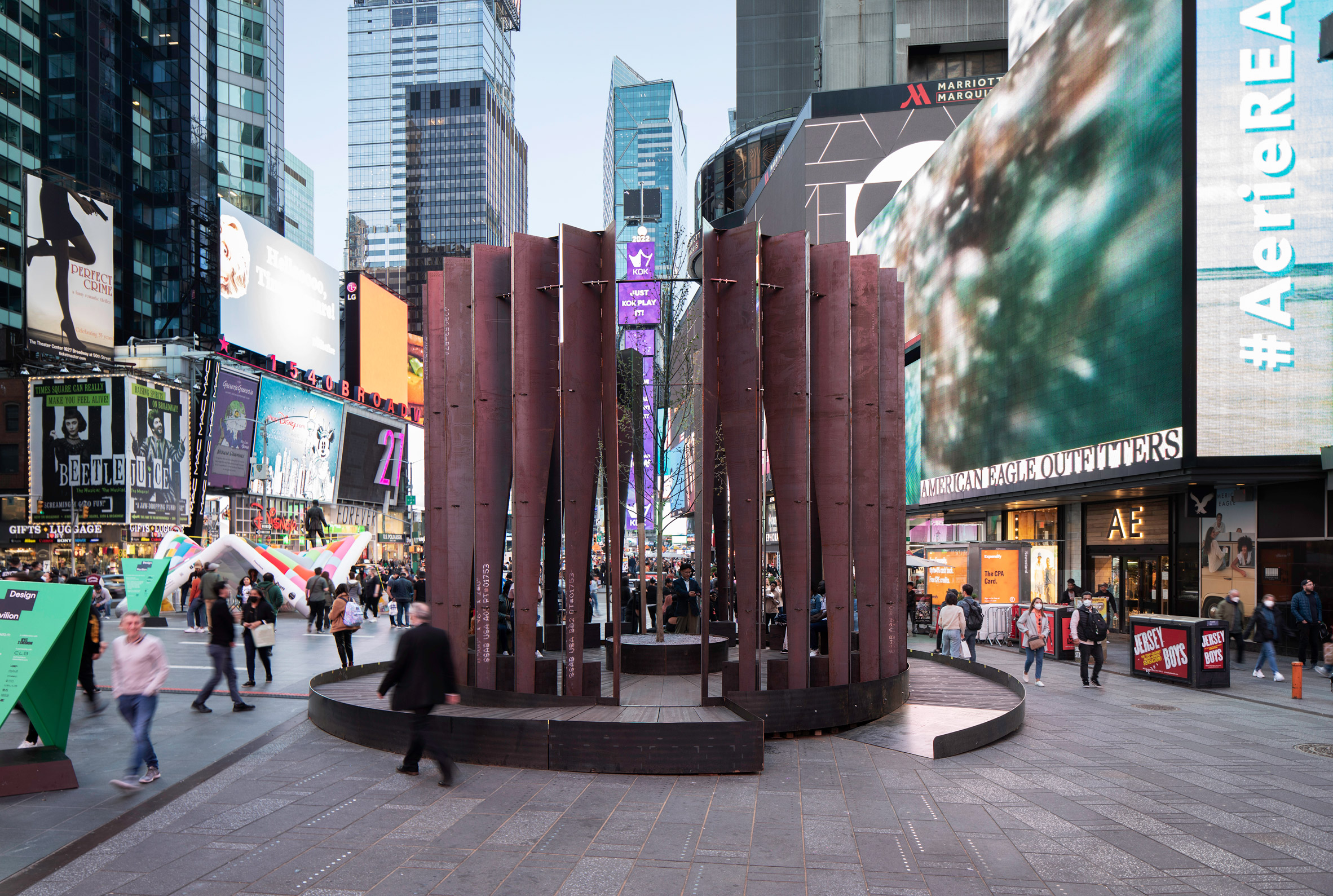 steel beam sculpture in the middle of time square