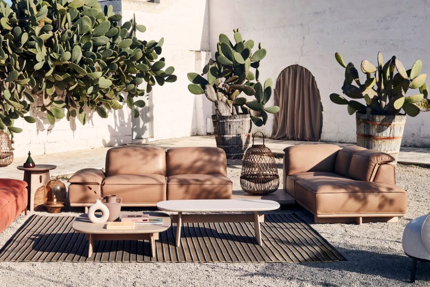 A photograph of Nauzzi's leather sofas in a outside terrace