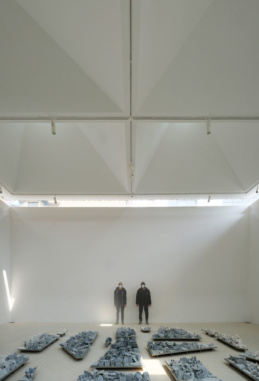White-walled art gallery by ASA North