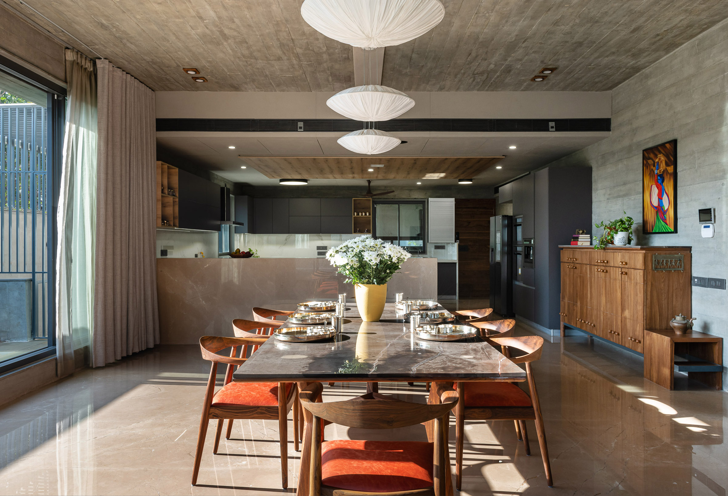 Interior image of a formal dining area at the concrete home