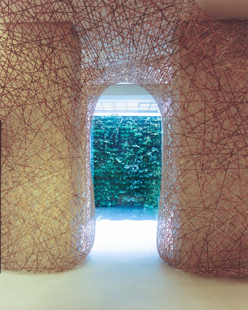 Image of a bamboo archway at Casa Loewe