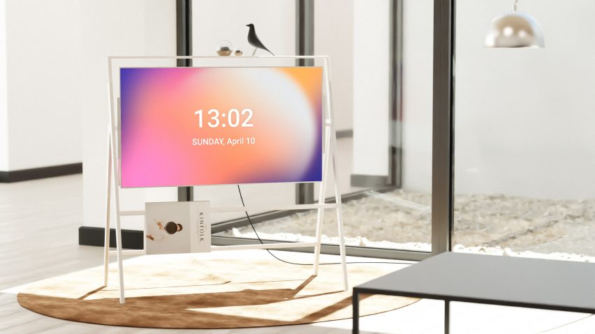 Easel OLED display mounted in a contemporary interior with date and time displayed