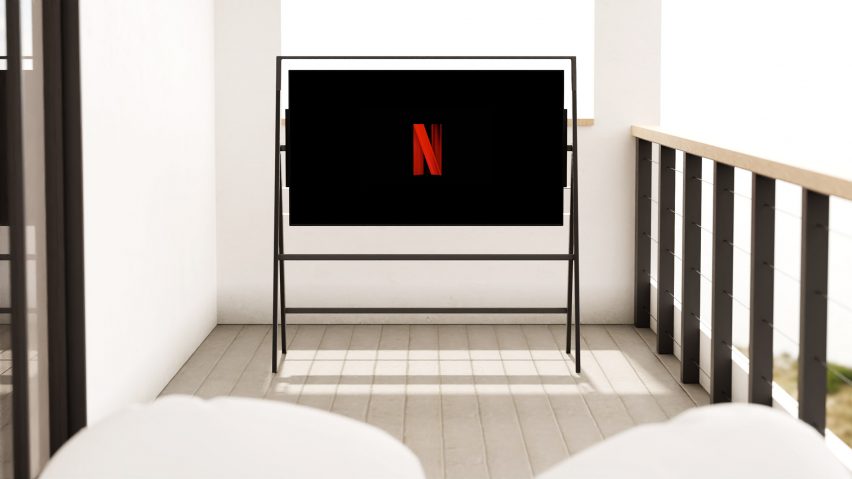 Easel OLED display mounted on a balcony with Netflix logo on screen