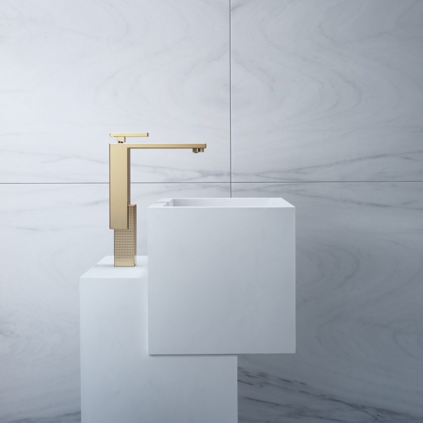 Gold Edge tap by Axor on a white geometric sink