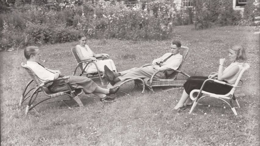 Black and white photo of Erich Dieckmann lounging with three friends