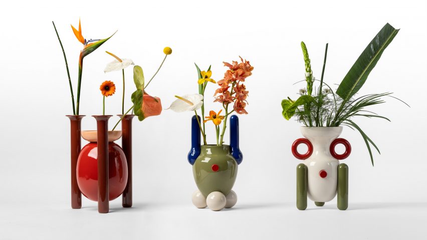 Three Explorer vases by BD Barcelona containing leaves and flowers