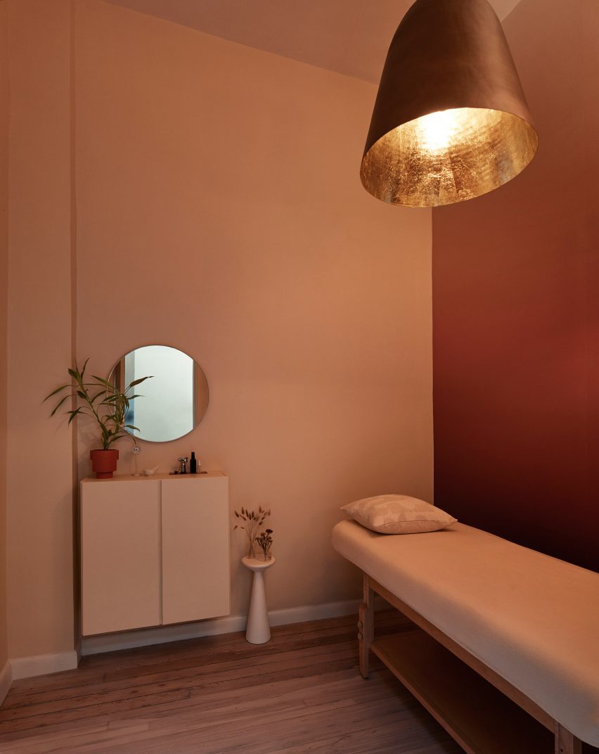 An acupunctre room with a bed