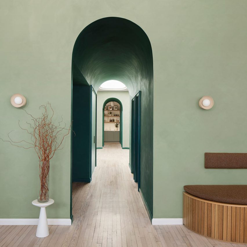 A green archway at Moxi wellness studio
